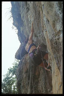 Kim Gibbs climbing "Gengis Bond" (6b) at the Keep