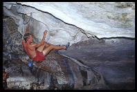 David Benson bouldering "By Way of Deception" (7a) for the camera