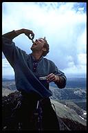 Jean-Claude enjoying his summit Sardines. Wind River Range, Wyoming