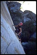Chris Williamson leading a Josh classic, Solid Gold  (5.10a). Joshua Tree NP, California