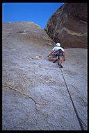 David Benson leading Tumbling Rainbow (5.10a). Joshua Tree NP, California