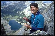 David Oka showing his resourcefullness eating a can of tuna with his nut tool. Wind River Range, Wyoming